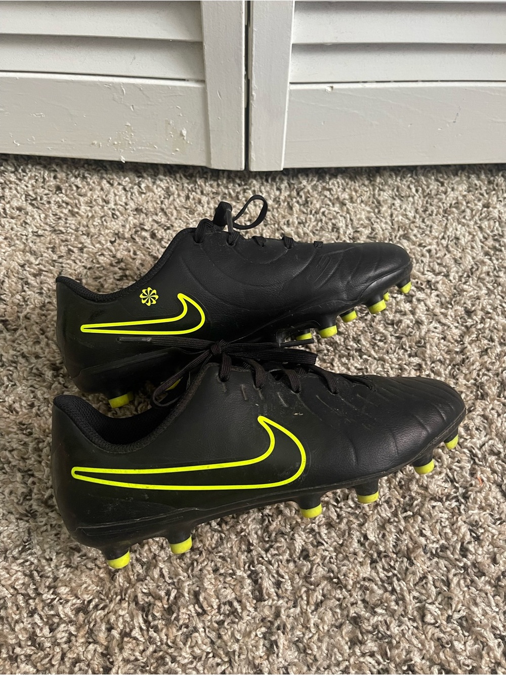 Nike Youth Black Soccer Cleats with Neon Green Accents